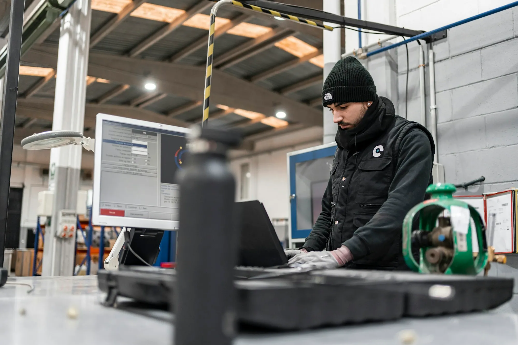 An operator working at a machine interface