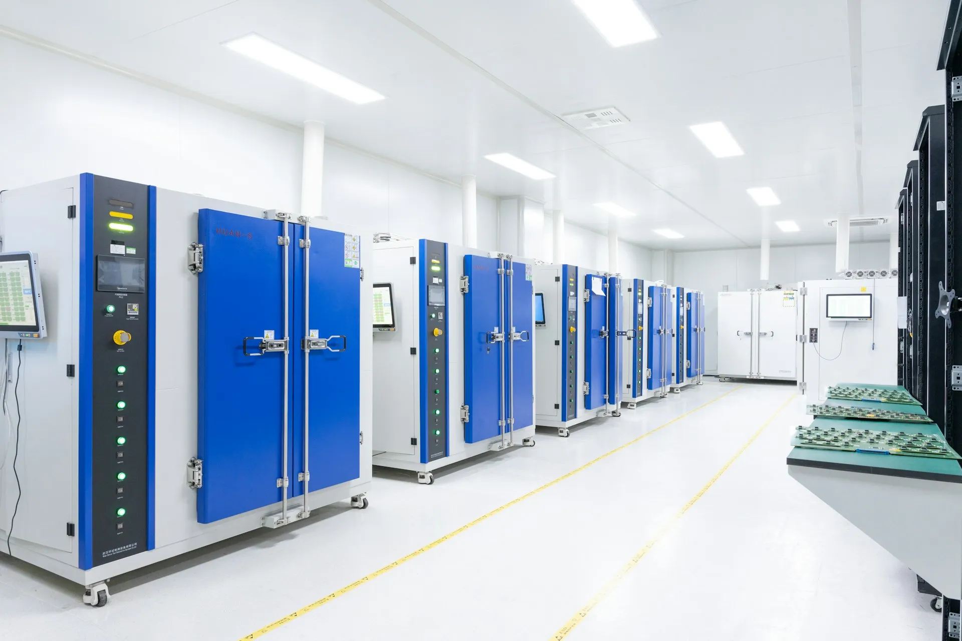 Production is a different place from the lab: more connections, higher rates and someone to call at 3 a.m. are what push the choice to Enterprise or a cloud service. Bright production room lined with rows of blue and white industrial test chambers