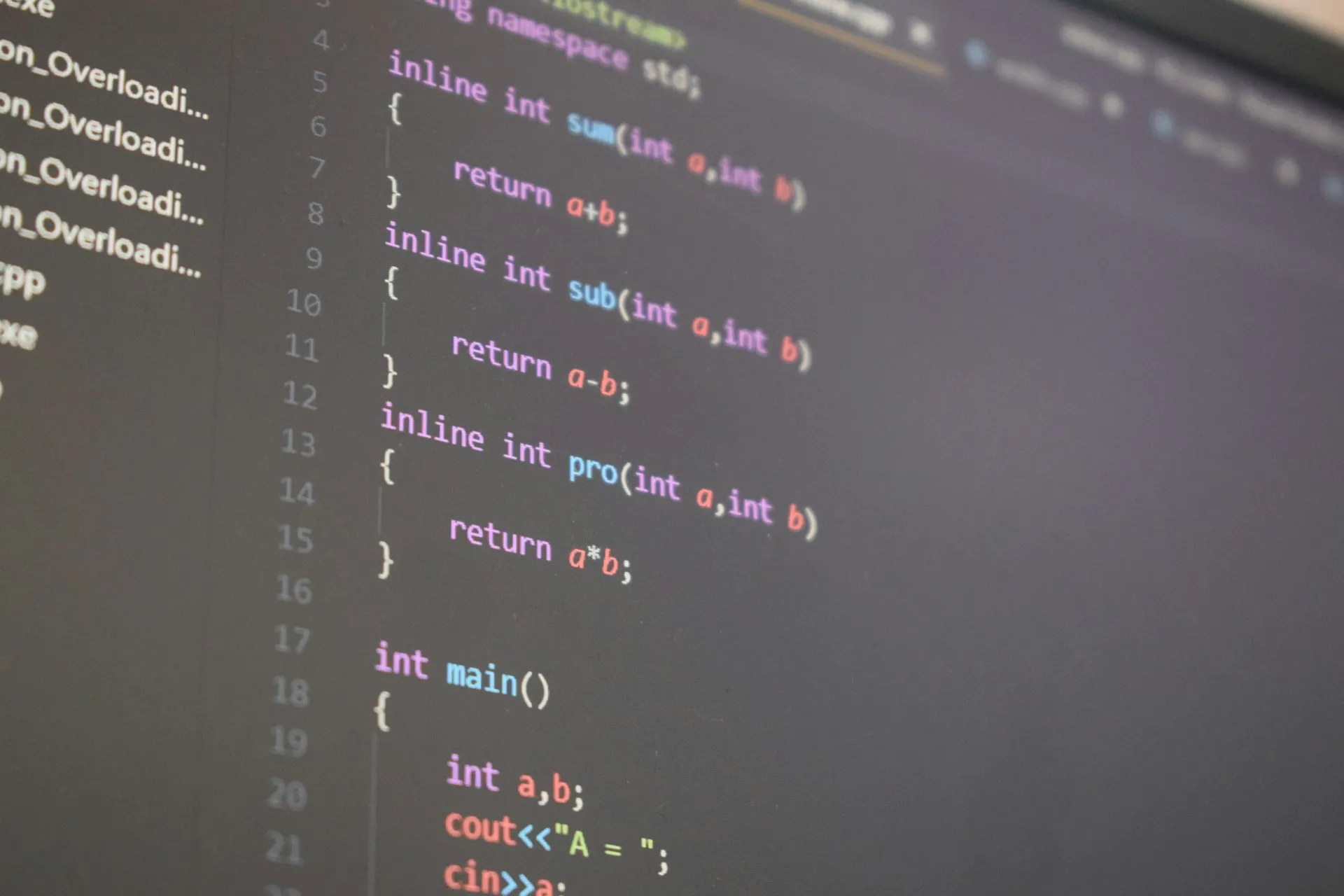 A clean compare on the vendor's sample project proves little. Ask to see your own oldest project, and an edit you made, on the screen. Angled view of a monitor showing numbered lines of source code with syntax highlighting
